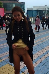 an asian woman is having her big breast shaved and fucking in stockings